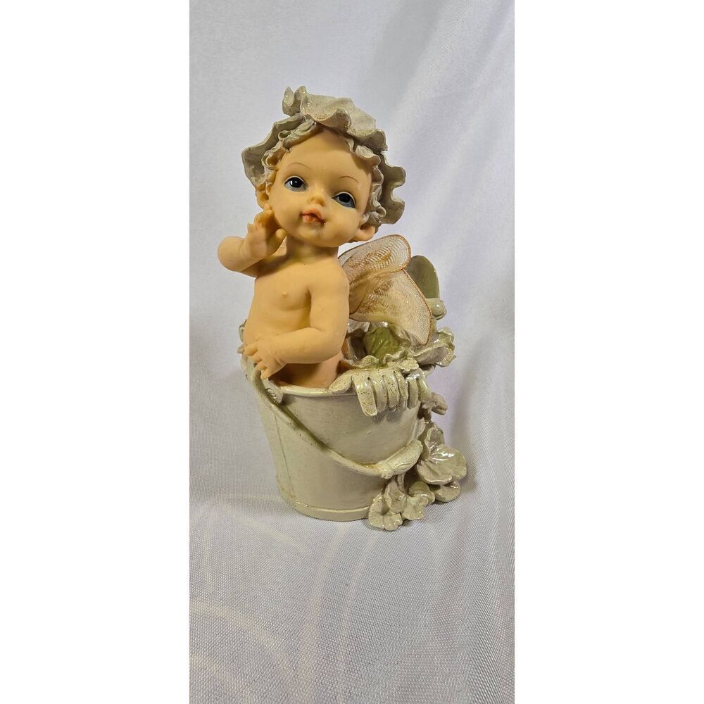 Vintage Baby Angel in a Flower Pot Coin Bank